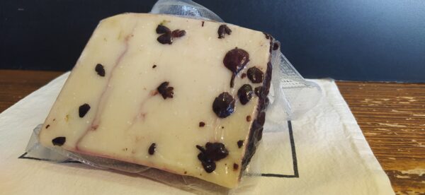 Pecorino Stagionato alle vinacce di Cesenese Nero - spicchio - immagine 2
